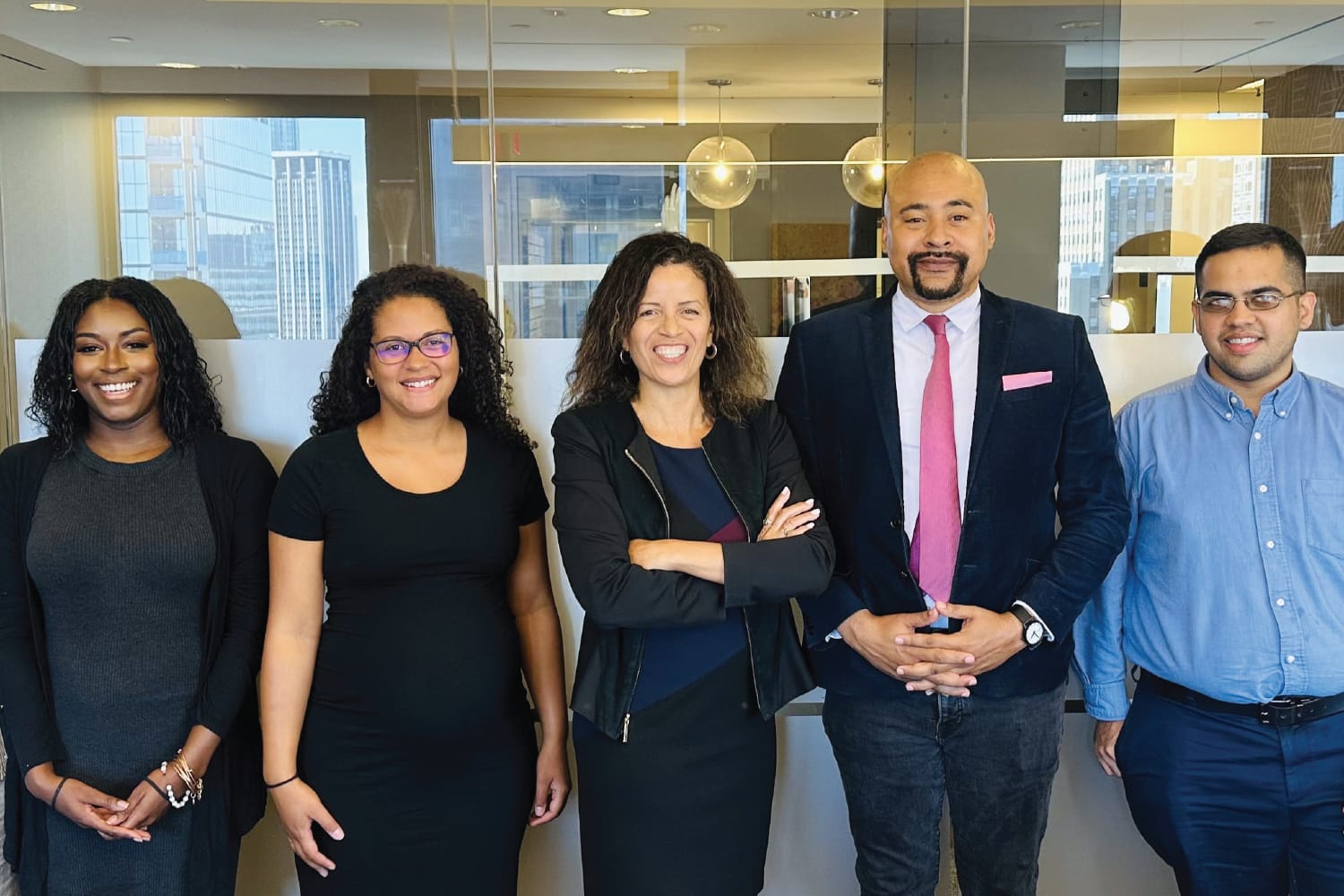 AARIS Design Architects Founder & Principal, Nicole Hollant-Denis (fourth from left) with her team