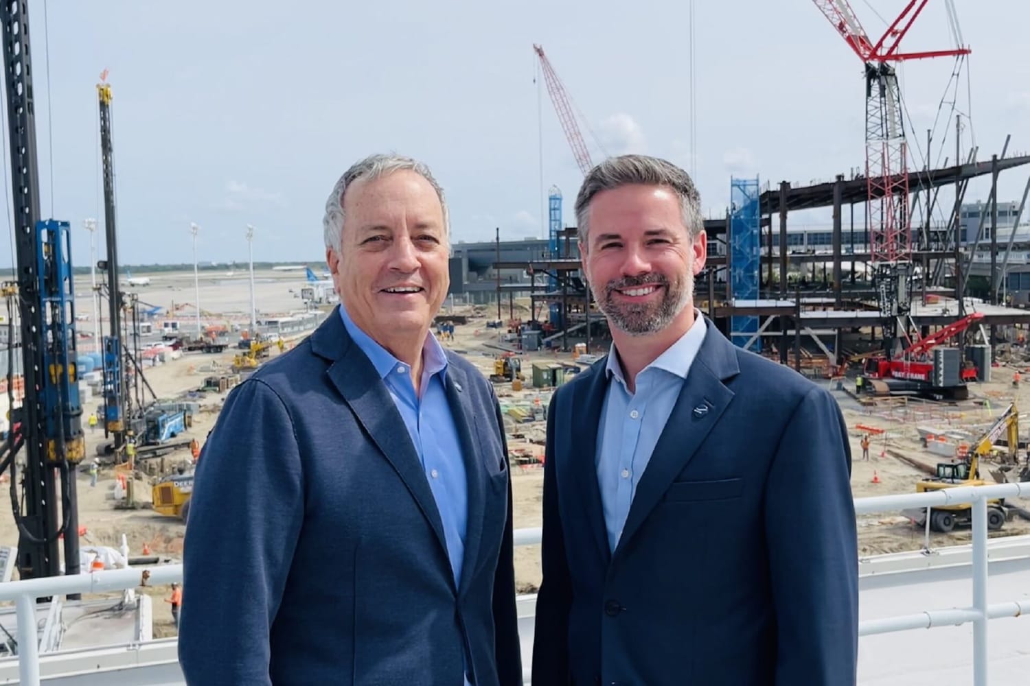 Vantage Airport Group CEO George Casey with JMP COO Steve Thody overlooking the Terminal 6 construction site. 